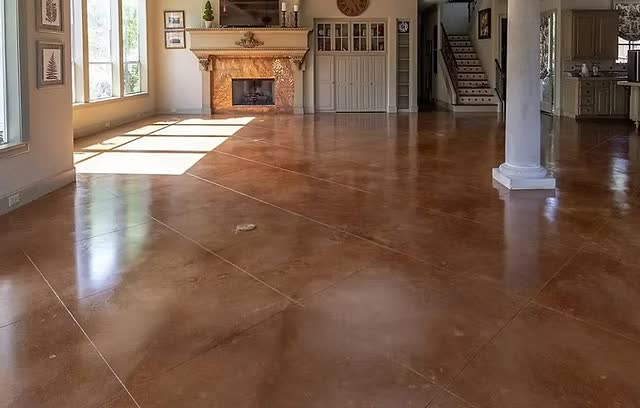 Concrete crack being filled and resurfaced with structural repair material before coating