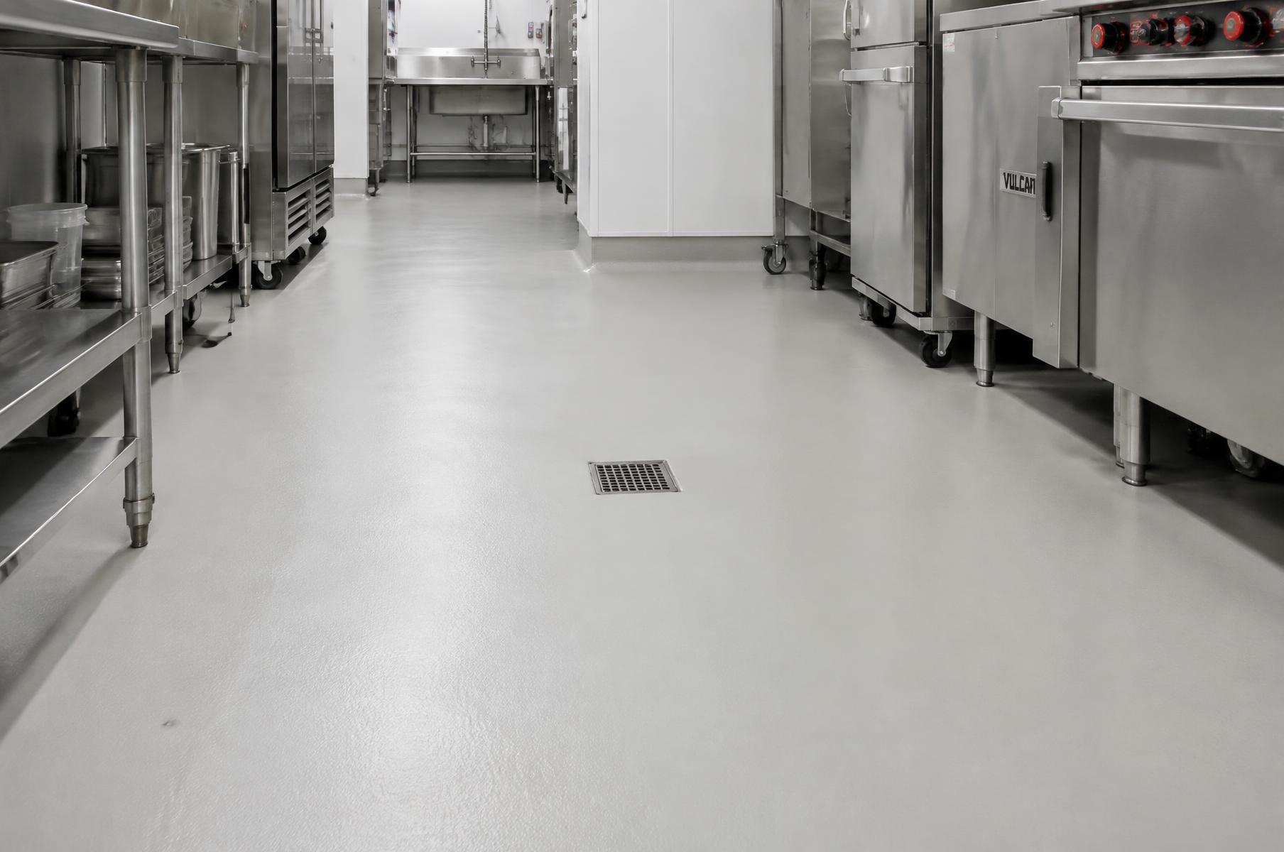 Seamless grey resin flooring in a commercial kitchen in Green Cove Springs, FL